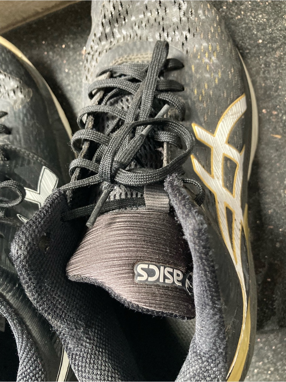 Asics Black Athletic Shoes with Gold Logo